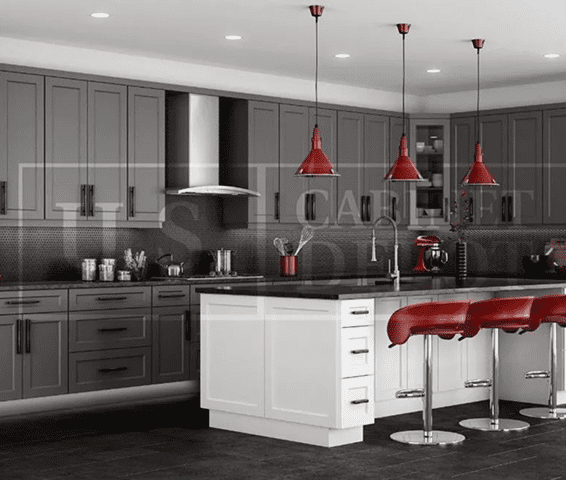 Modern kitchen with red accents and a central island.